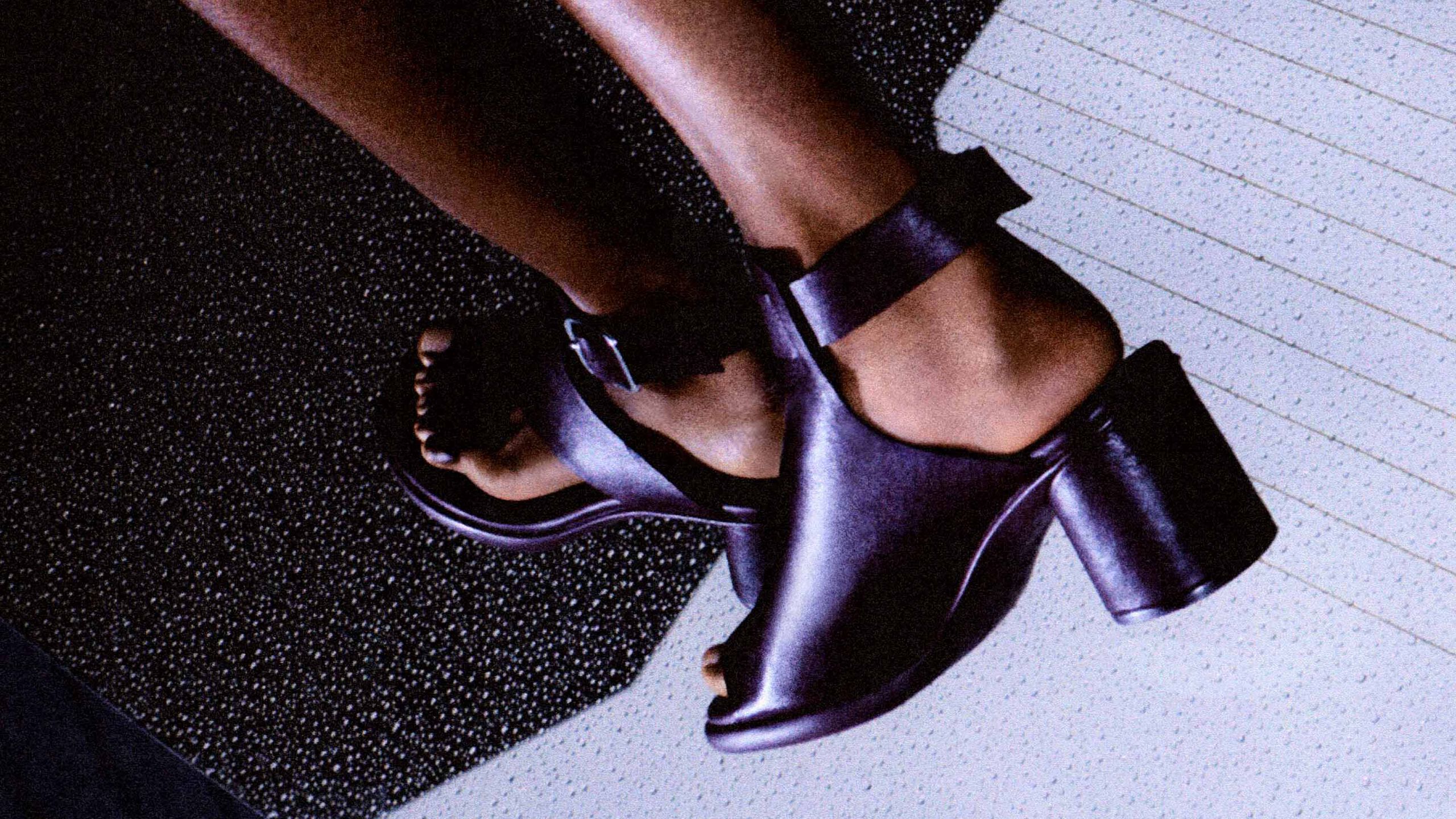 Woman wearing black heels
